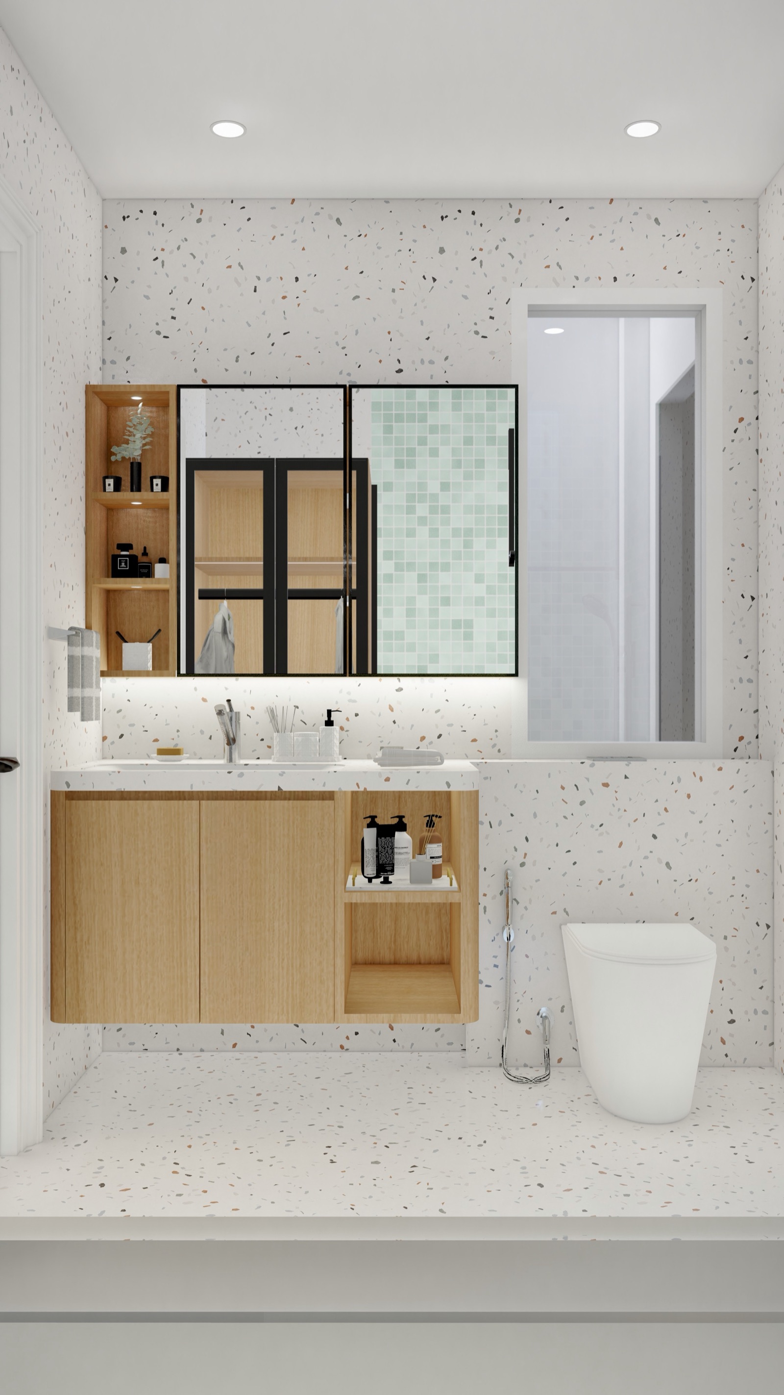 Design render of a compact bathroom with white terrazzo-pattern tiles on the walls and floor: a wall-hung oak vanity with a white counter and an open shelf, a black-framed two-panel mirror with a lit lower edge, an open wooden niche beside it, a back-to-wall WC with a health faucet, and a glazed opening on the right