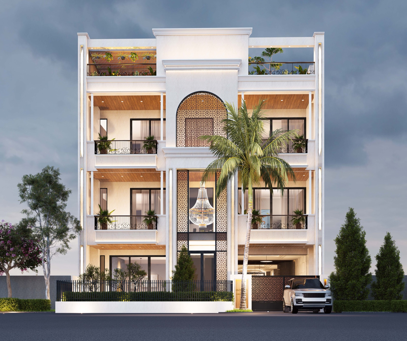Design render of a white four-storey house front at dusk in Rohtak: a tall perforated geometric screen runs up the centre in front of a double-height glazed stair, an arched screen panel crowns it, black ornamental railings guard the balconies on either side, and a matching perforated gate closes the parking