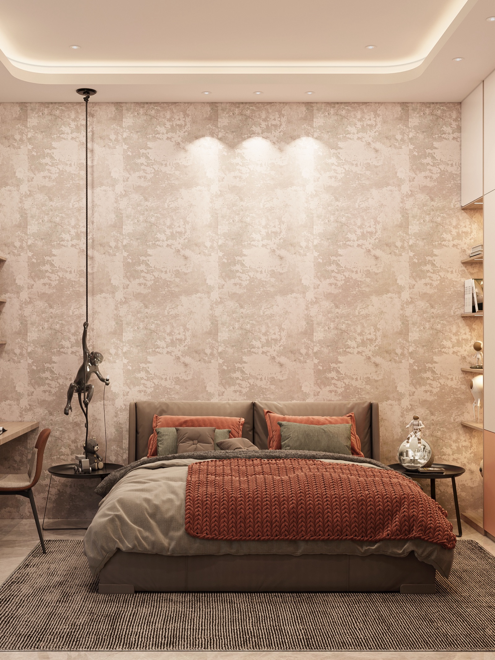 Design render of a bedroom where the whole bed wall is covered in a blush and beige mottled wallpaper, the vertical joins between drops visible, lit by three spotlights above a grey upholstered bed with rust cushions, with open shelves on the right and a hanging monkey lamp on the left