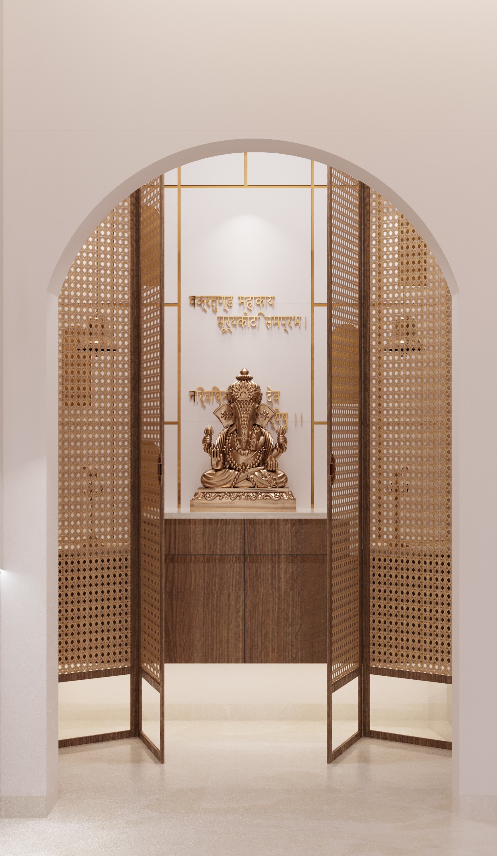 Design render of a mandir set in an arched opening in a white wall: a brass Ganesha idol on a walnut cabinet, a white back wall with brass inlay lines and a Sanskrit shloka in brass letters, and two pairs of folding screens with a dense cane-weave jaali pattern in walnut frames, folded open to each side