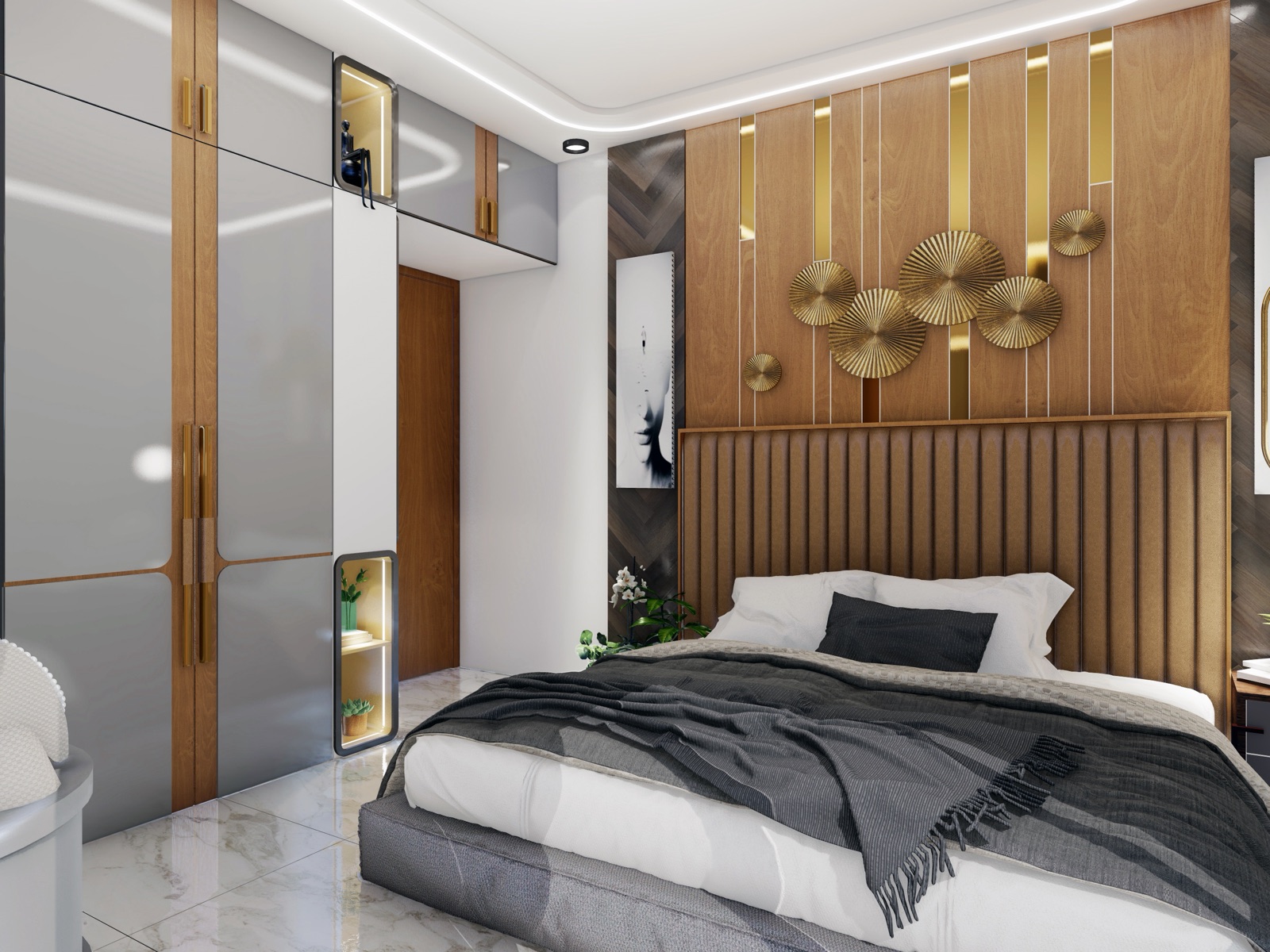 A bedroom wardrobe with high-gloss grey shutters edged in wood-tone strips and long brass handles, a loft row above, and two backlit display niches in the side panel, next to a bed with a wood-panelled back wall.