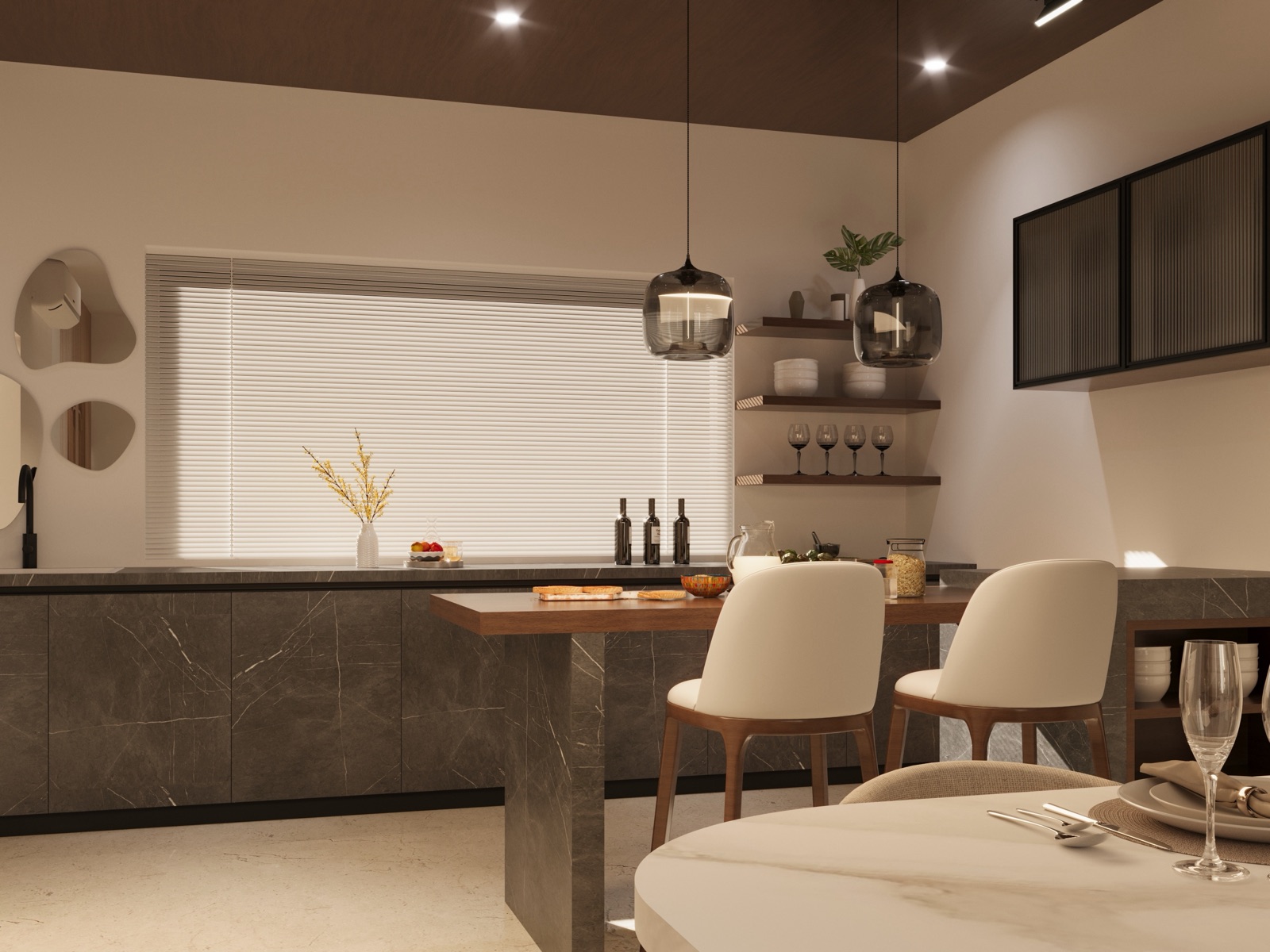 Design render of a kitchen with dark grey marble-look base cabinets and counter, a wooden breakfast ledge with two cream upholstered chairs, two smoked-glass pendants hanging low over the ledge, floating wooden shelves with bowls and wine glasses, a wide window with white blinds, and the edge of a round white marble-look dining table set with plates, cutlery and glasses in the foreground.