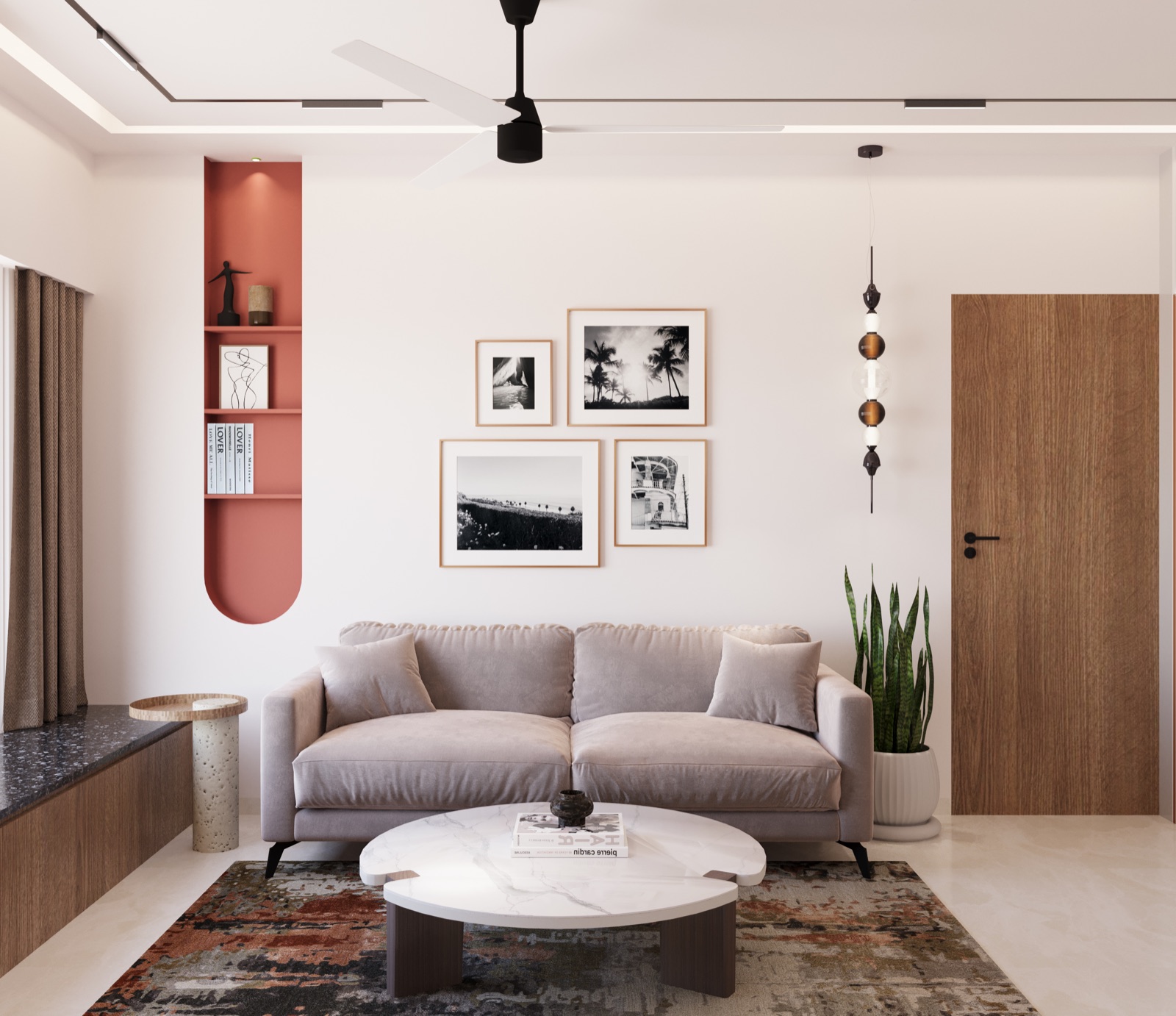 Design render of a Mumbai apartment living room with a pale grey two-seater sofa, a round marble coffee table, a terracotta-red arched wall niche with shelves, framed black and white prints and a timber door